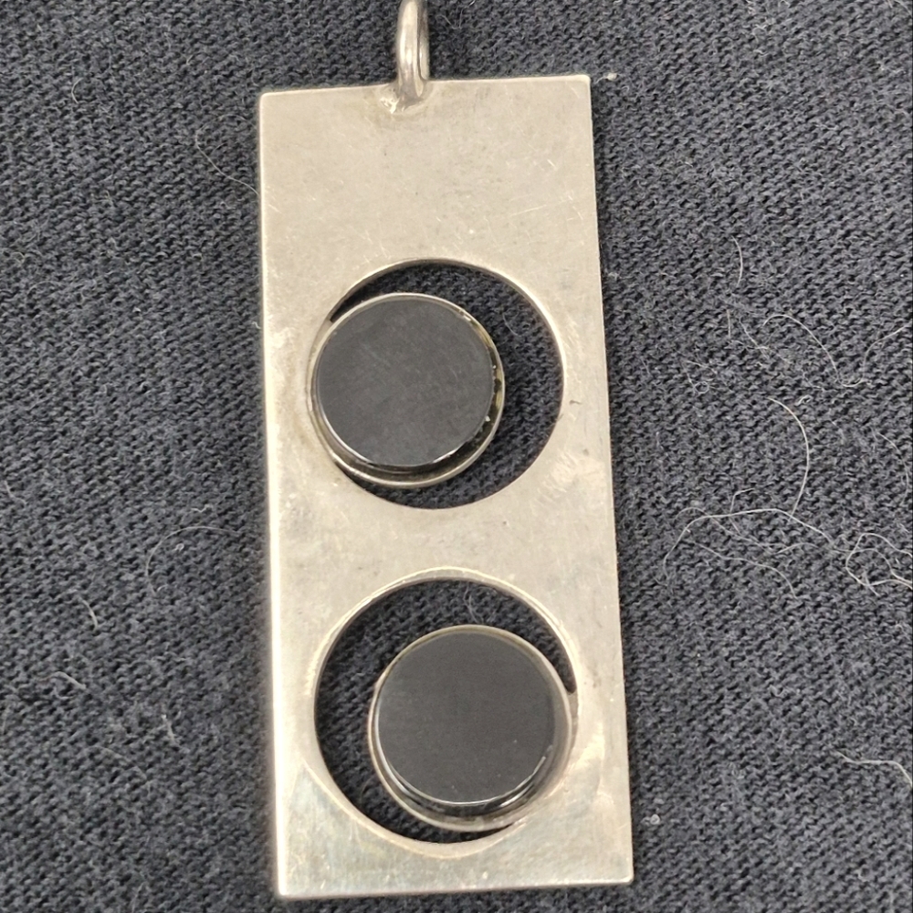 Sterling Silver Rectangle Pendant With Two Circular Black Stones
